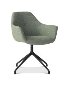 Dyyk Ids draaibare eetkamerstoel in zachtgroene stof met zwarte aluminium draaivoet.