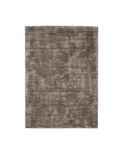 Rechthoekig vloerkleed in sage groene kleur met een subtiele, glanzende afwerking.