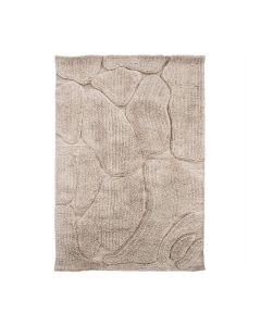 Vloerkleed Kala met steenachtige patronen en zachte texturen in neutrale tinten.