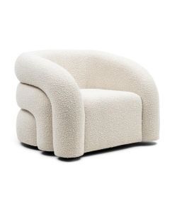 Draaibare fauteuil Vittorio met zachte bouclé stof en elegante rondingen, perfect voor een moderne, luxe uitstraling.
