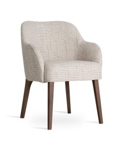 Armstoel met tulpvormige rug in beige stof en houten poten schuin van voren gefotografeerd