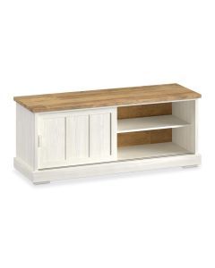 Tv-meubel Eldora in wit met warm houtkleurig blad, voorzien van een schuifdeur en twee open vakken op een lichte achtergrond