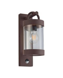 Roestkleurige Sambesi buitenwandlamp met bewegingssensor en cilindervormige glazen kap.