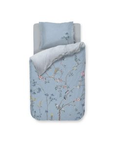 Pip Studio Bamboo Blossom dekbedovertrek met bloesemtakken, paradijsvogels en tegelprint op de achterzijde.