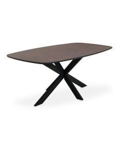 Schuin vooraanzicht van eettafel Walden Terrazzo Bronze met Deens ovaal bruingrijs tafelblad en zwarte spinpoot
