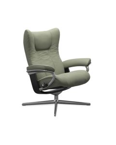 Stressless Wing relaxfauteuil met hocker in groen leer met metalen draaivoet