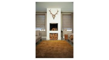 Sauvage Dégradé vloerkleed in warme bruintinten met kleurverloop, gestyled in woonkamer voor open haard.