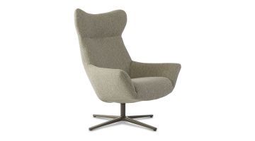 schuinaanzicht draaifauteuil Joe met een gestoffeerde zitting in lichte grijstinten en een zwart metalen draaivoet.