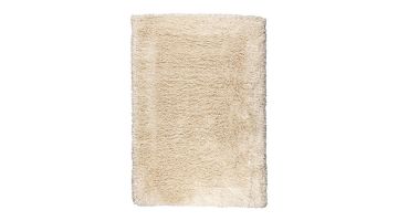 Curly vloerkleed van Zuiver in crèmekleur, volledig overzicht.