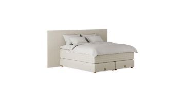 Stijlvol Anemoia bed met een strak en minimalistisch design, afgewerkt in zachte, natuurlijke tinten.