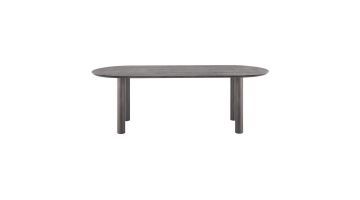 Elegante eettafel Oranta van Inhouse in een ovale vorm, uitgevoerd in luxe bruin eikenhout met stevige ronde poten.