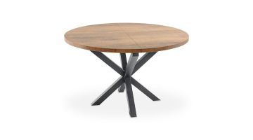 Ronde uitschuifbare eettafel Caltana met zwart metalen spinpoot en tafelblad in warme mangohoutkleur.