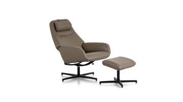 Schuin vooraanzicht van de Montèl Vision XL draaifauteuil, met ergonomische vorm en geïntegreerde hoofdsteun.