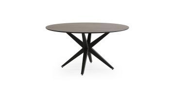 Moderne ronde eettafel Ranea met donkergrijs steenlook blad en zwarte metalen spinpoot – vooraanzicht.