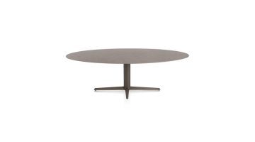 Eetkamertafel Saluti van XOOON met HPL blad in lava, frontaal weergegeven met ovaal tafelblad en metalen onderstel in steelbrown.