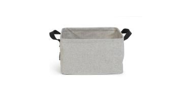 grijze stoffen opvouwbare wasmand van brabantia met zwarte hengels aan de zijkanten