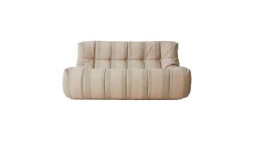 Beige lounge bank met gestikte vlakken en knopen, frontaanzicht vrijstaand op witte achtergrond.