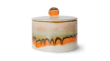 Cookie Jar Burst close-up – ronde keramieken koekjestrommel met oranje en groen glazuur, deksel met knop.