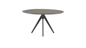 Organische eetkamertafel van Baenks met HPL blad in Italian Stone en zwart metalen onderstel