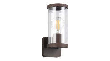 Bonito wandlamp in roestkleur met transparante glazen cilinder, schuin van voren.