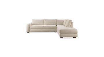 Beige hoekbank Famatina met chaise longue rechts, losse rugkussens en ronde houten poten.