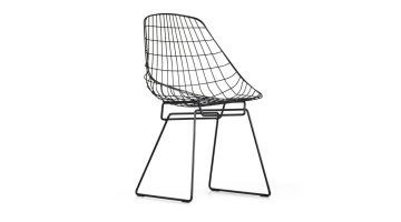 Zwarte Wire chair van Cees Braakman met open staaldraad frame en minimalistisch design