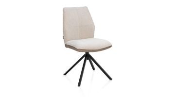 Eetkamerstoel Franky met beige Livigno chenillestof en Oregon microvezelstof, zwart metalen draaionderstel en comfortabele rugleuning, schuin van voren gefotografeerd.