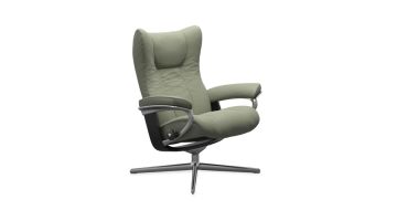 Stressless Wing relaxfauteuil met hocker in groen leer met metalen draaivoet