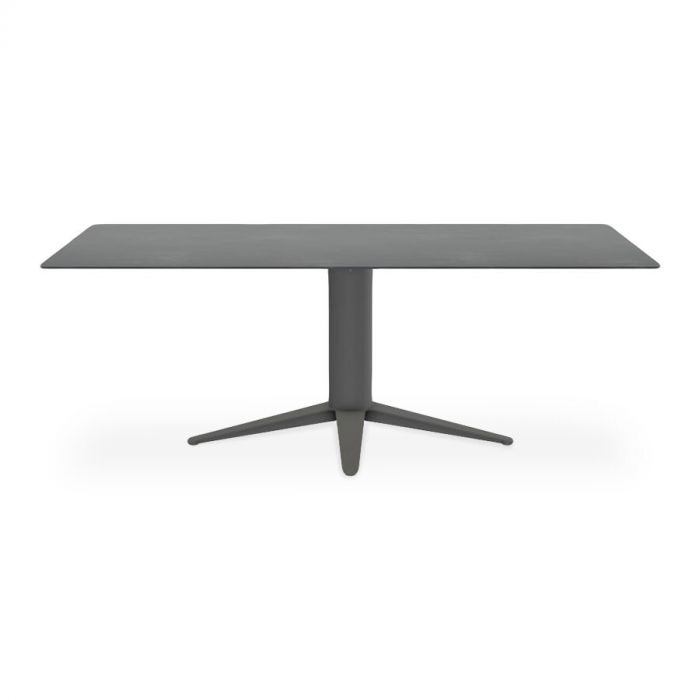 Minimalistische Carve eettafel met rechthoekig blad en kolompootontwerp door Hans Daalder, weergegeven in een moderne grijze uitvoering.