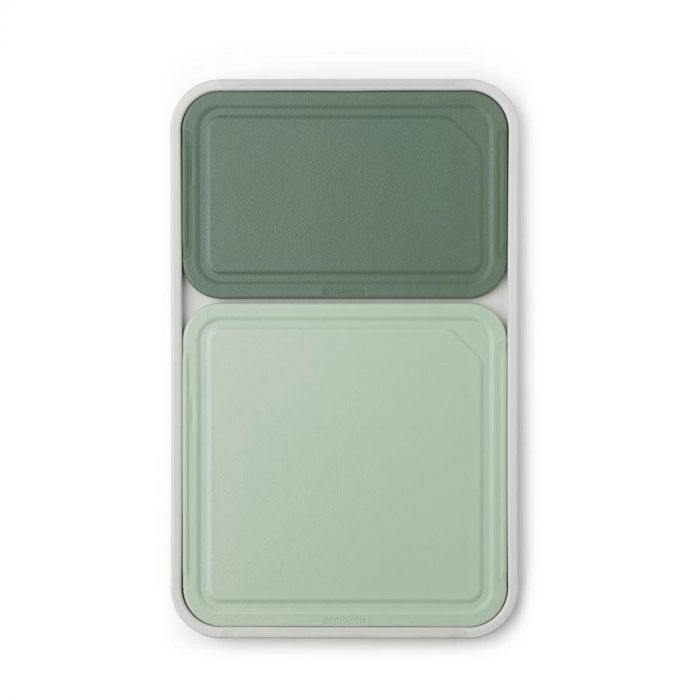 Nestbare Tasty+ snijplankenset in drie maten, in groene tinten, netjes gestapeld.