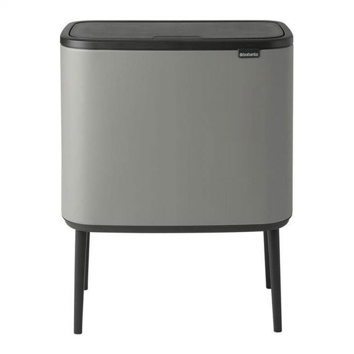 Brabantia Bo Touch Bin 36L in betongrijs, strak en modern design, frontaal weergegeven op verhoogde poten.