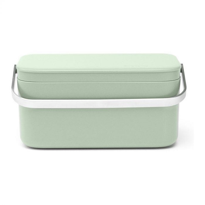 Lichtgroen Brabantia aanrecht afvalbakje met een strak design en roestvrijstalen handvat.