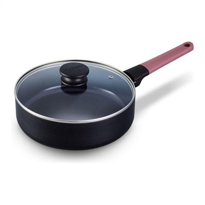 Collectie Brabantia Tasty+ pannen en keukenaccessoires met kleurrijke handgrepen op een wit keukenblad.