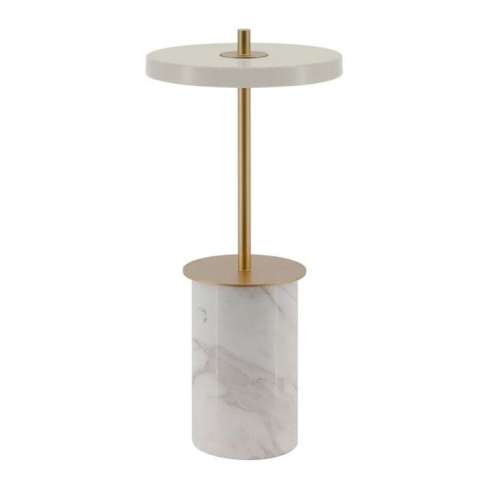 Asteria Move Mini tafellamp met een marmeren voet en messing details, in een minimalistisch design.