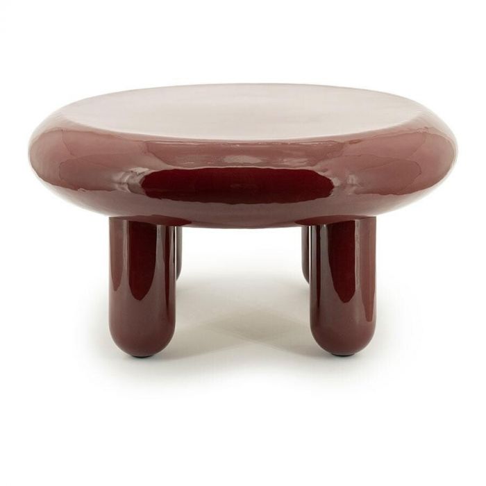 Opgevouwen Mosa plaid in beige met zwarte strik.