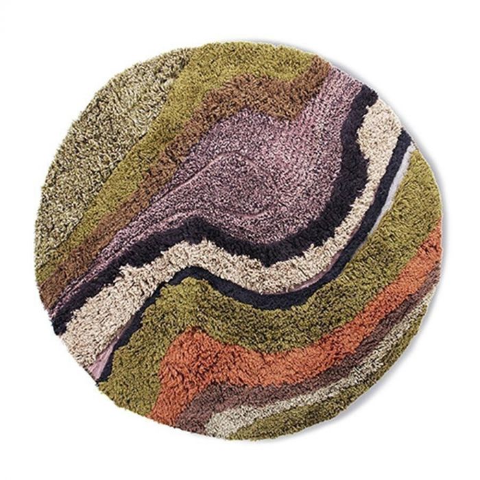 Rond vloerkleed met golvend patroon in groen, paars, bruin, oranje en beige tinten, bovenaanzicht van het design.