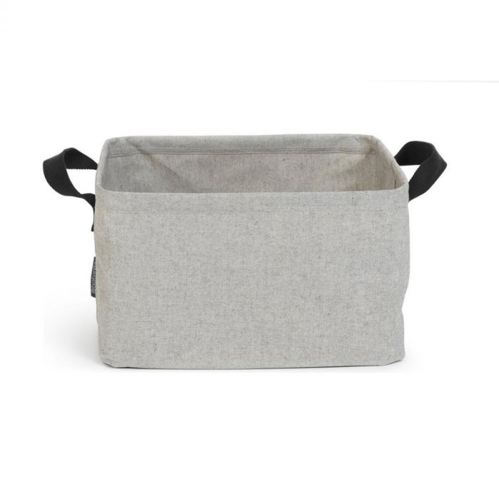 grijze stoffen opvouwbare wasmand van brabantia met zwarte hengels aan de zijkanten