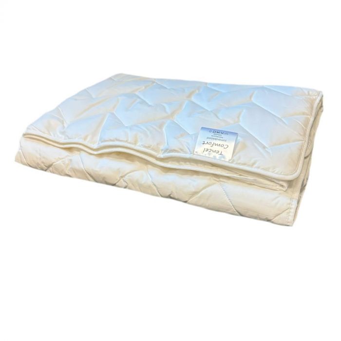 Opgevouwen Tencel Comfort zomerdekbed van Timzo Bedding met perkal katoenen tijk.