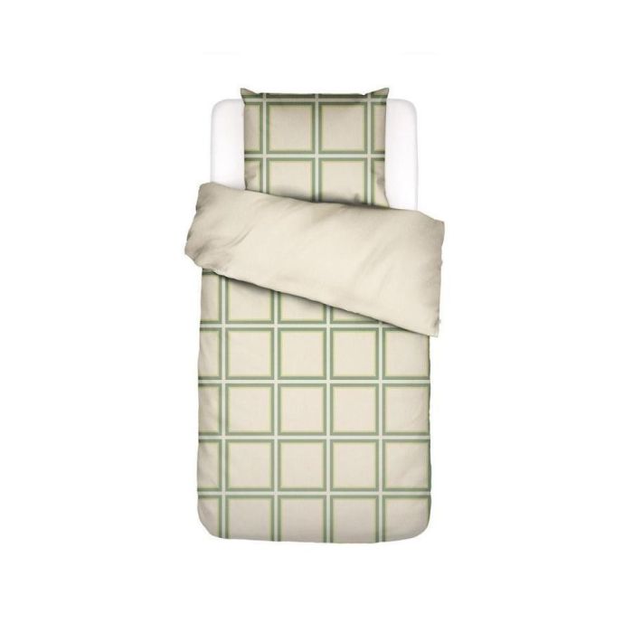 Essenza Luca dekbedovertrek vanilla met geometrisch vierkant patroon op bed