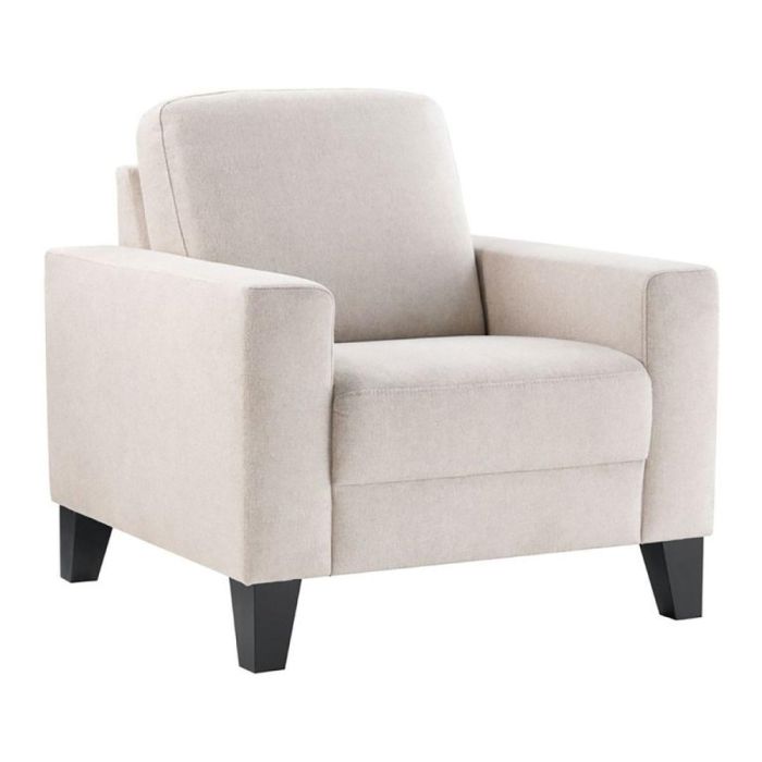 INHOUSE fauteuil Montilla beige schuin van voren met brede armleuningen en zwarte poten