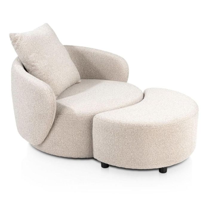 Draaifauteuil Elise met hocker in beige bouclé stof met ronde vormen en zwart pootje tegen lichte achtergrond