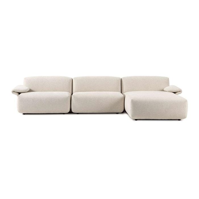 Crèmekleurige modulaire elementenbank Olen met chaise longue en zachte bouclé stof.