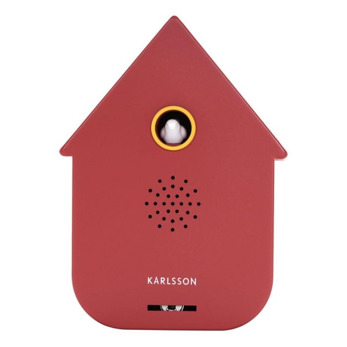 Karlsson Sound Box Modern Cuckoo in okerrood met huisvorm, rond vogelvenster en geïntegreerde speaker.
