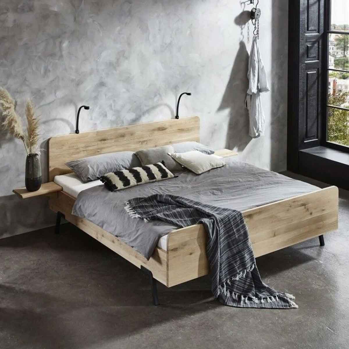 Industriele slaapkamer met houttinten en grijze kleuren